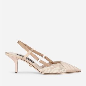 Feminine, lightly worn Dolce & Gabbana heal. Worn only once to a wedding.
